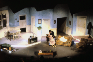 Slide from the play "Little Murders" at Lincoln College