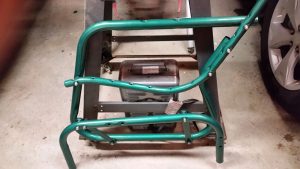 Finished metal tube frame for bench glider featuring new paint
