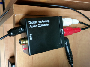 Digital optical audio to analog converter. This is one of the two that I purchased. There are others on the market that are better looking, if you are concerned about that. This one is optical audio IN with analog RCA jacks OUT. There is also a coaxial IN connection, if you need that.