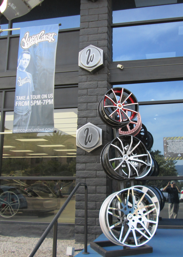 Wheels indicate the front door to West Coast Customs in Burbank
