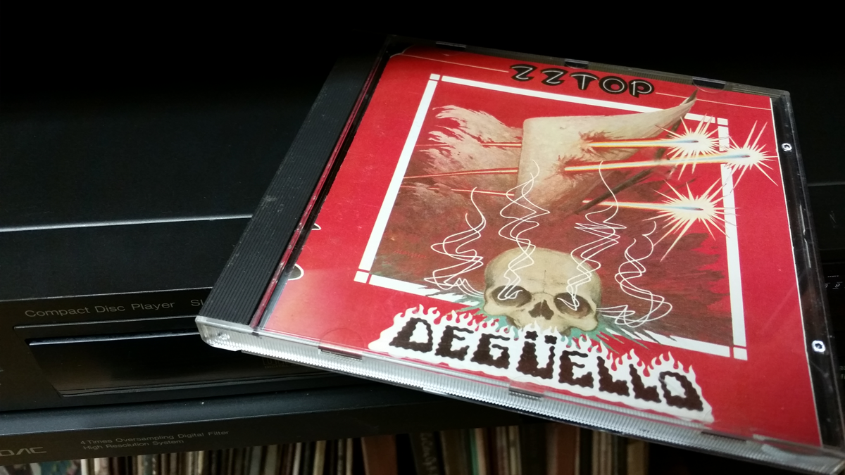 ZZ Top's CD "Deguello" sitting on top of a Technics CD player