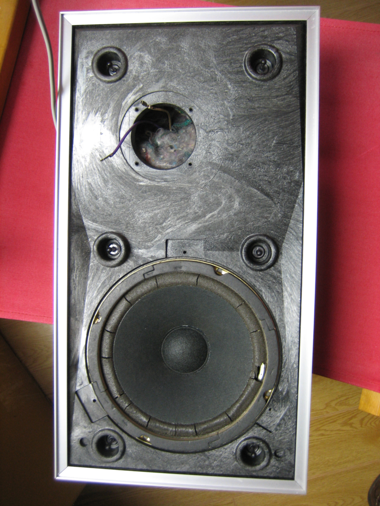 Beovox S2200 speaker with the front removed and showing the woofer and tweeter hole