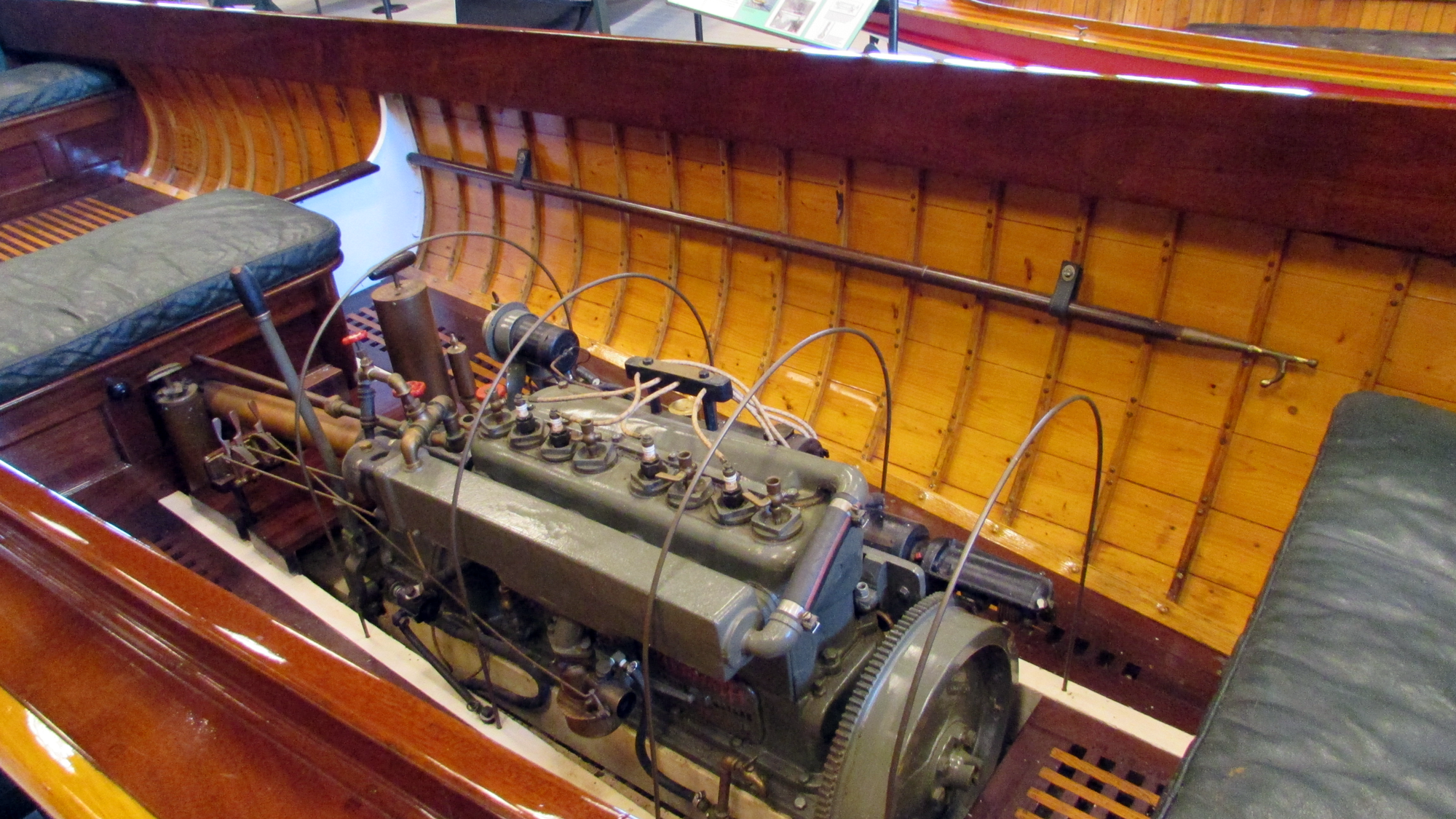 Engine powering a mahogany wood boat